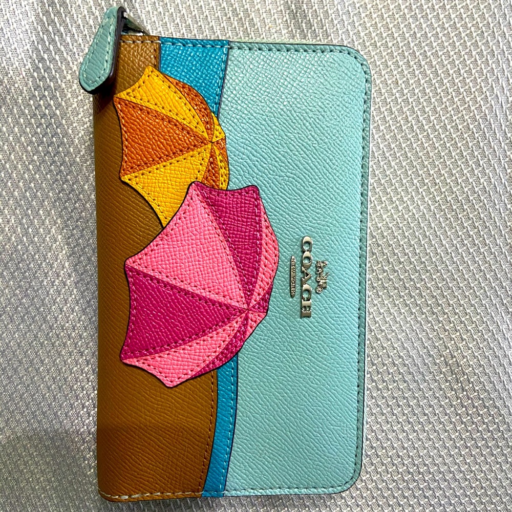 Coach umbrella zip wallet.
